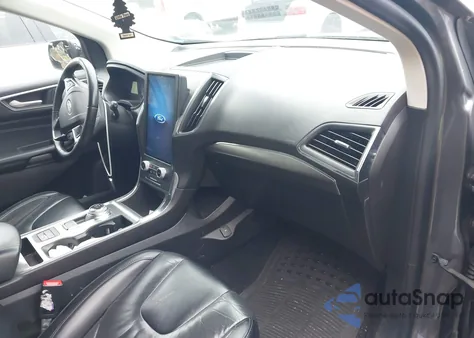 2022 Ford Edge Titanium z USA, uszkodzony, nr VIN 2FMPK4K90NBA35277